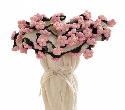 Éclosion corail – Couverture fleurie au crochet